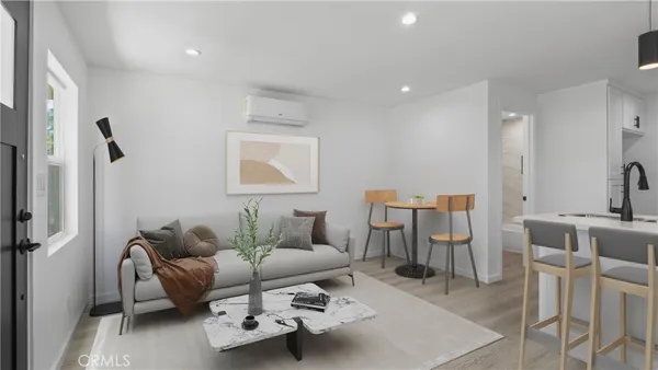 a living room with furniture and a table