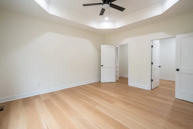 a bathroom with a shower and a sink