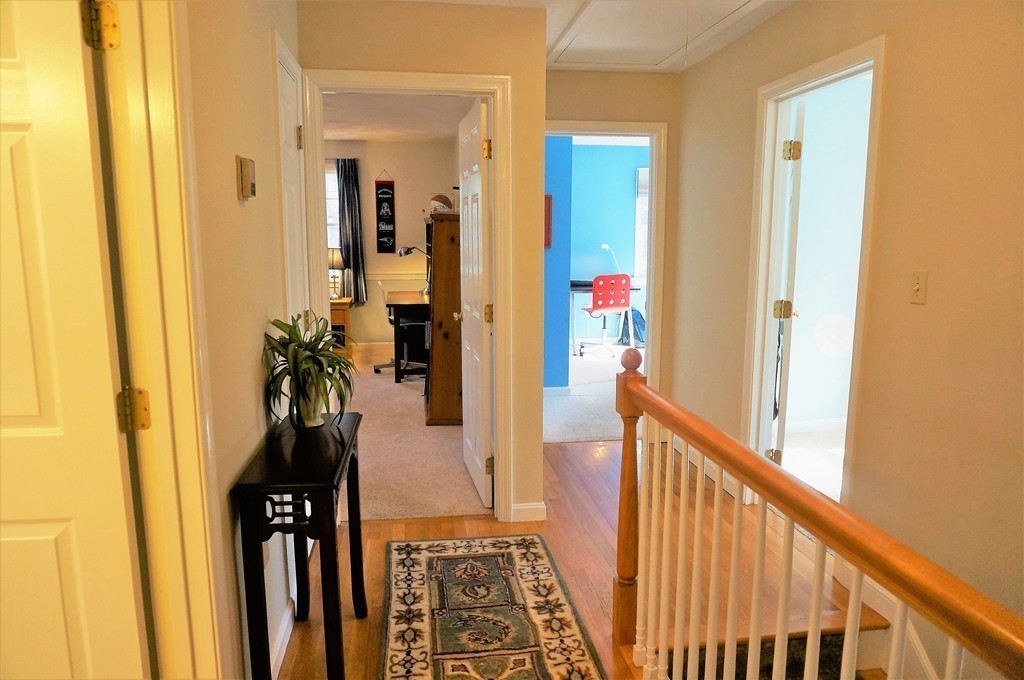 12 Barbara Road Sudbury, MA 01776 - Photo 13 of 26 a view of a hallway with a flower pot