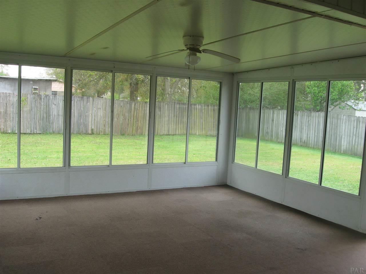 1023 Brownfield Road Pensacola, FL 32526 - Photo 4 of 4 a view of room with window and an outdoor view