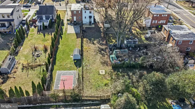 a kitchen with stainless steel appliances a refrigerator and a stove top oven