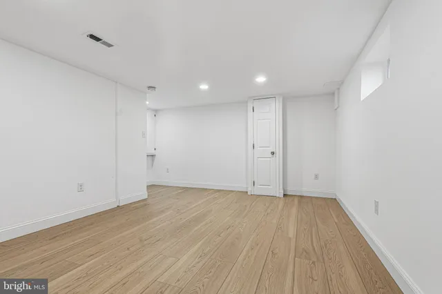 a view of a backyard of the house