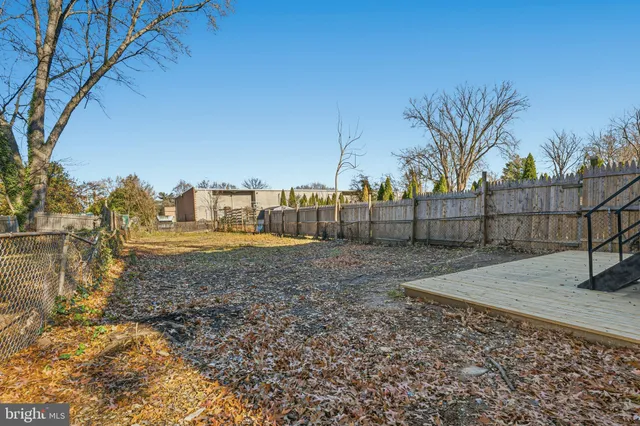 a view of a house with a back yard