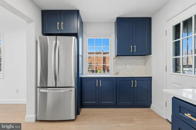 a bathroom with a sink toilet and mirror