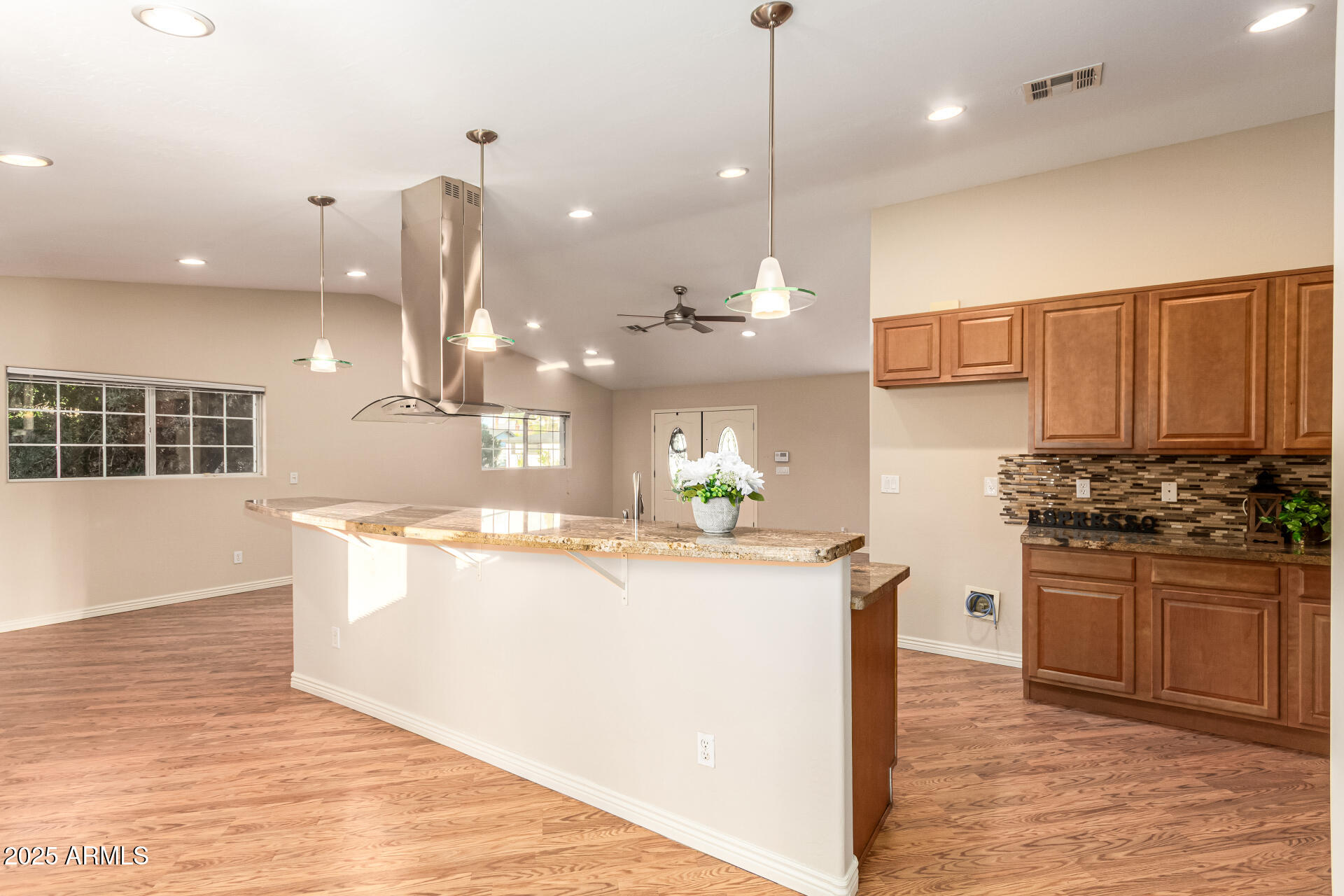 4112 4th Avenue Northwest Phoenix, AZ 85013 - Photo 16 of 39 a kitchen with kitchen island a counter top space appliances and cabinets