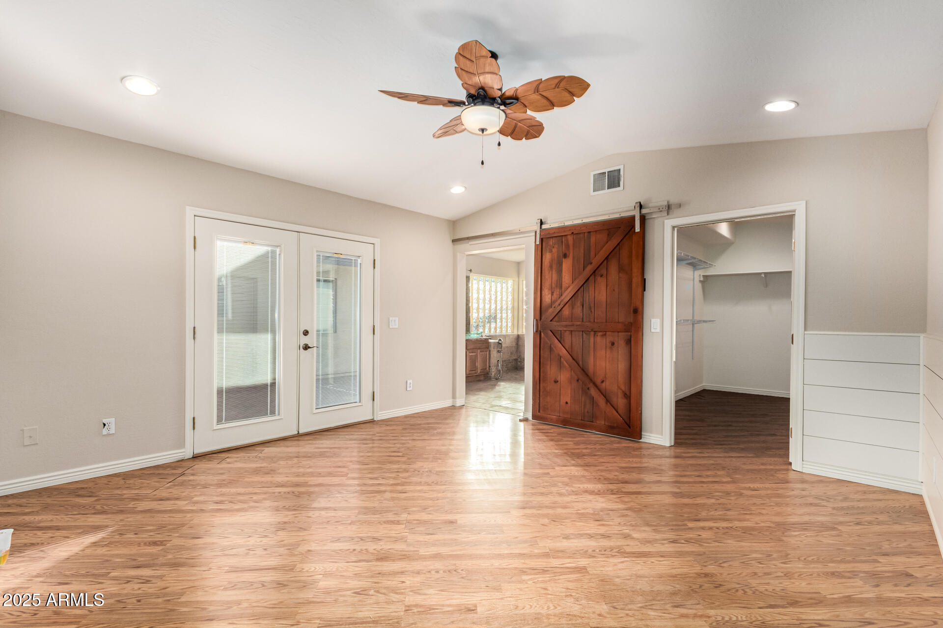 4112 4th Avenue Northwest Phoenix, AZ 85013 - Photo 18 of 39 wooden floor in an empty room with a window