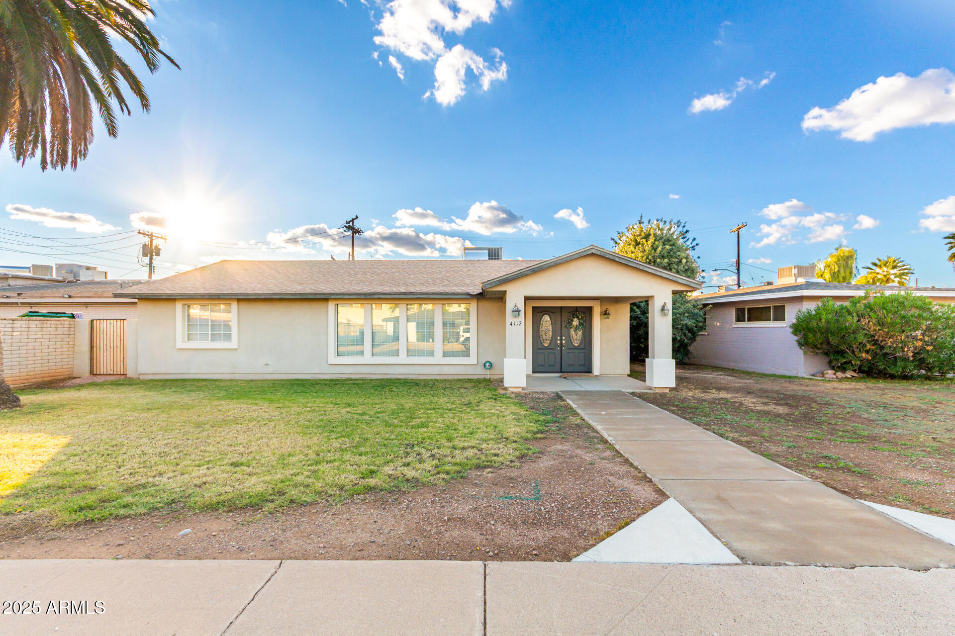 4112 4th Avenue Northwest Phoenix, AZ 85013 - Photo 39 of 39 a front view of a house with garden