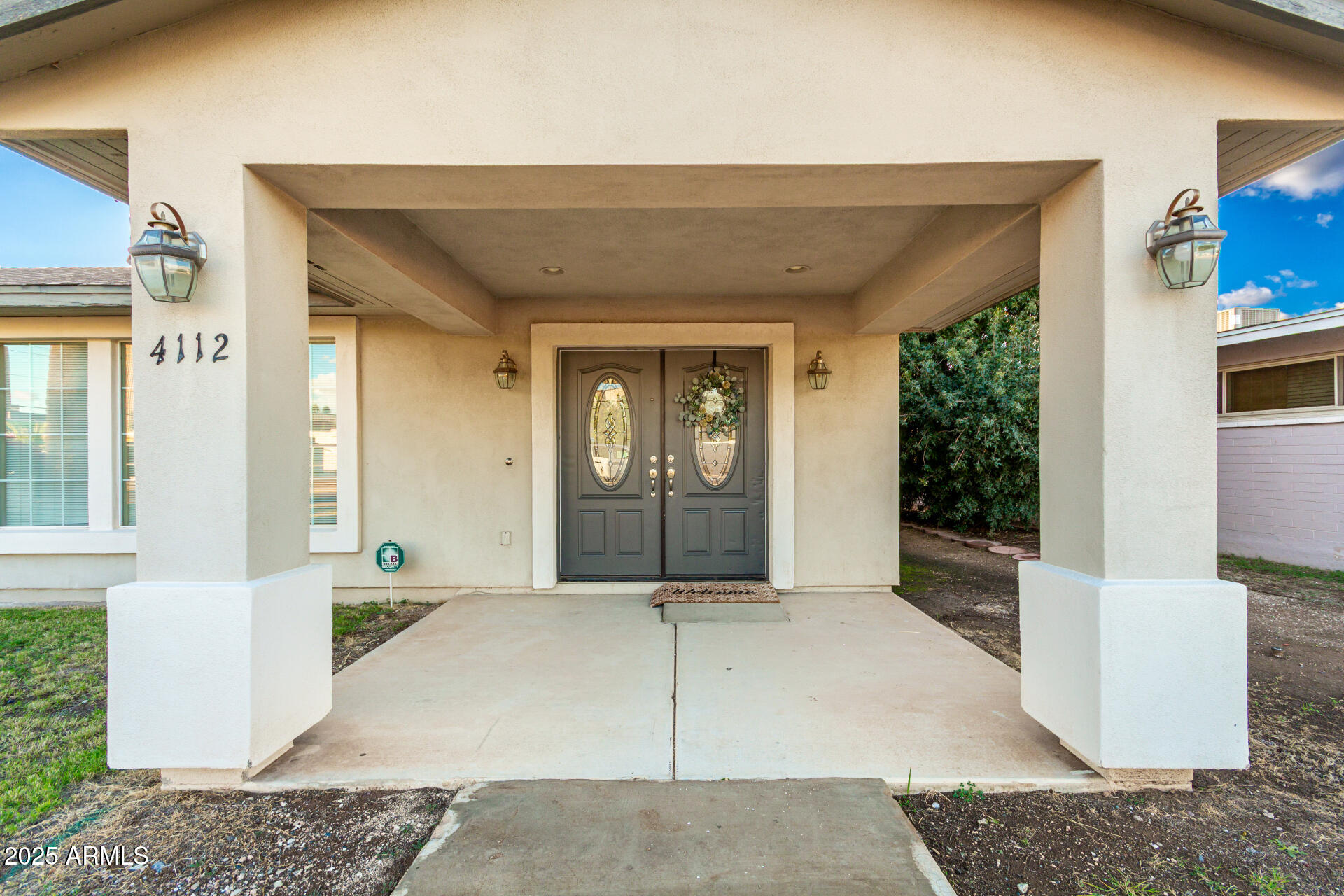 4112 4th Avenue Northwest Phoenix, AZ 85013 - Photo 4 of 39 a view of an entryway of house