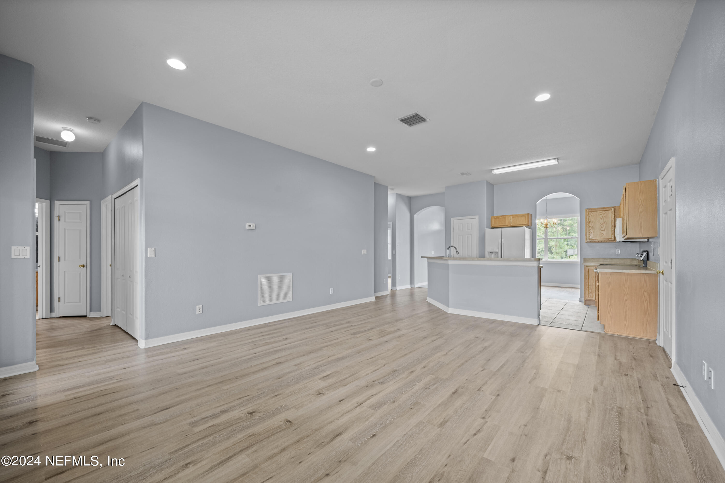 26 Zonal Geranium Trail Palm Coast, FL 32164 - Photo 18 of 35 a view of a kitchen with wooden floor