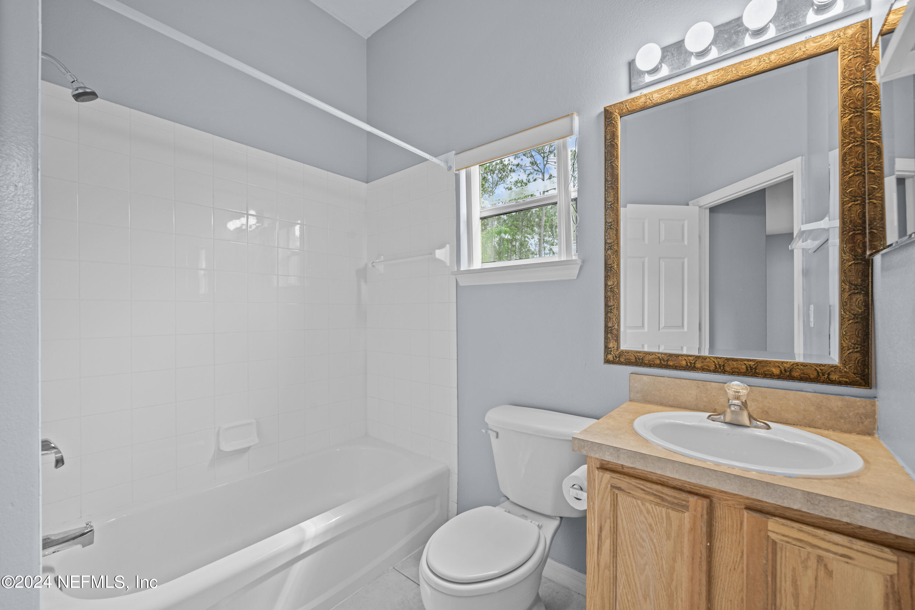 26 Zonal Geranium Trail Palm Coast, FL 32164 - Photo 23 of 35 a bathroom with a sink toilet and shower