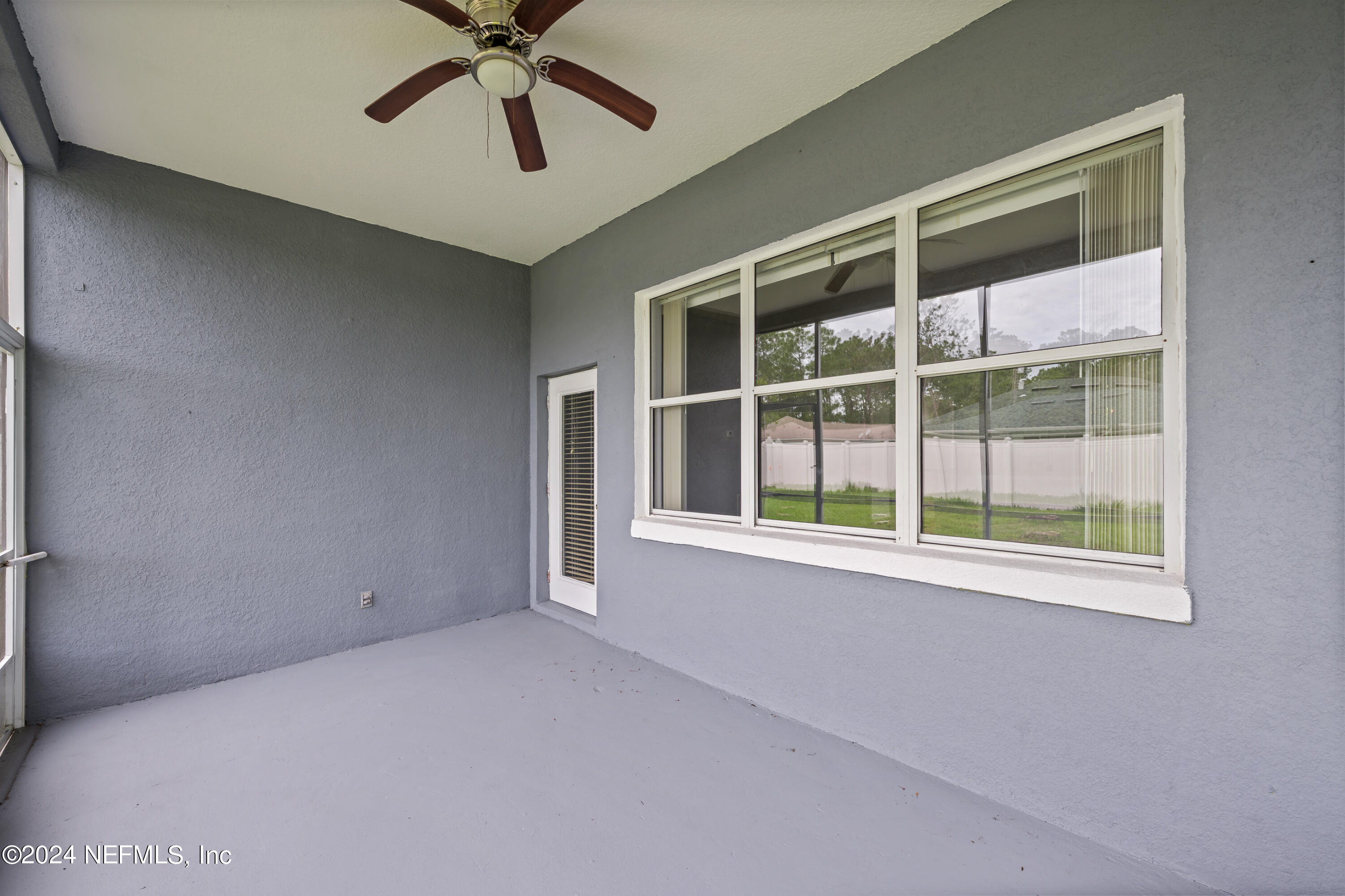 26 Zonal Geranium Trail Palm Coast, FL 32164 - Photo 27 of 35 a view of an empty room with a window