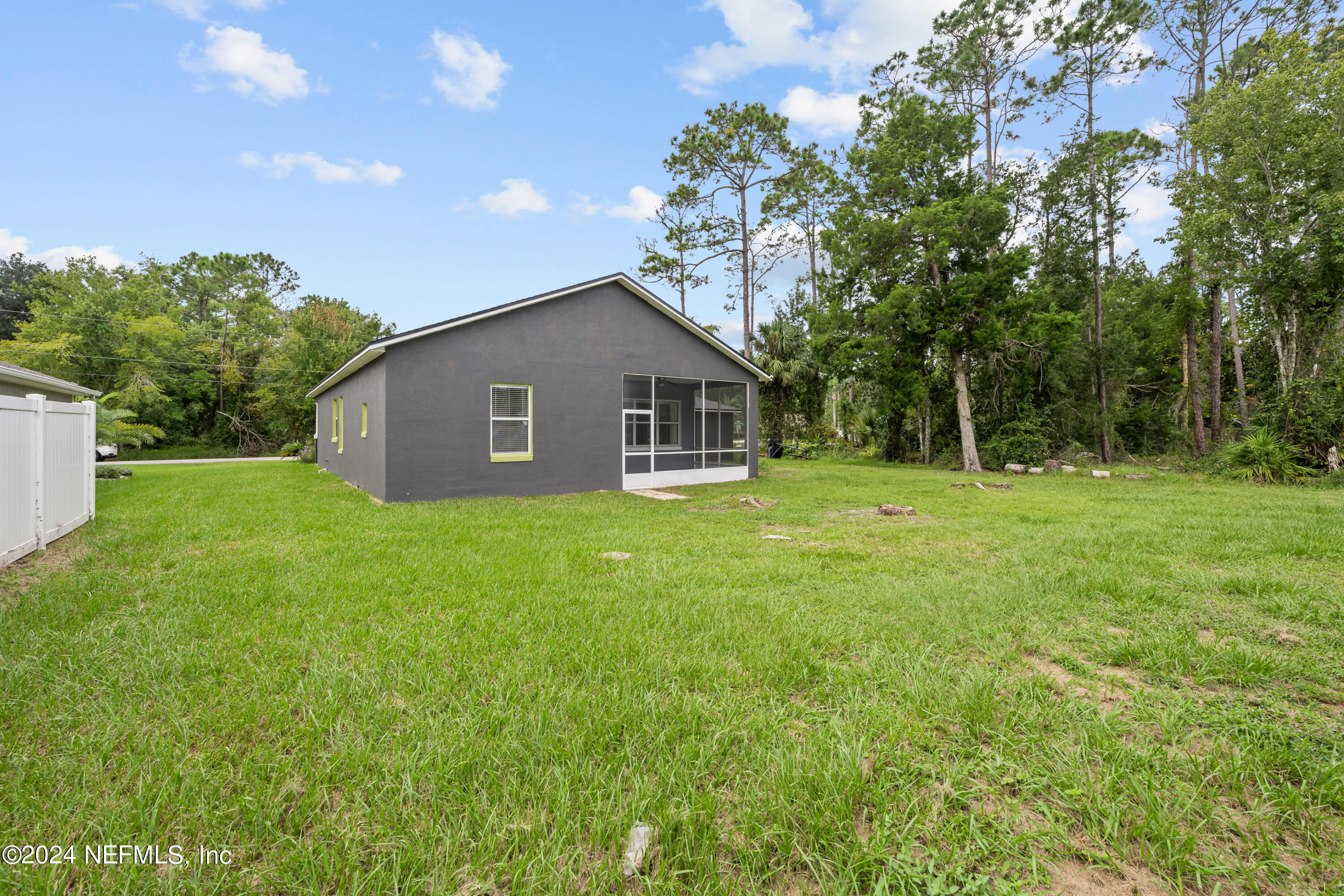 26 Zonal Geranium Trail Palm Coast, FL 32164 - Photo 31 of 35 a house view with a garden space