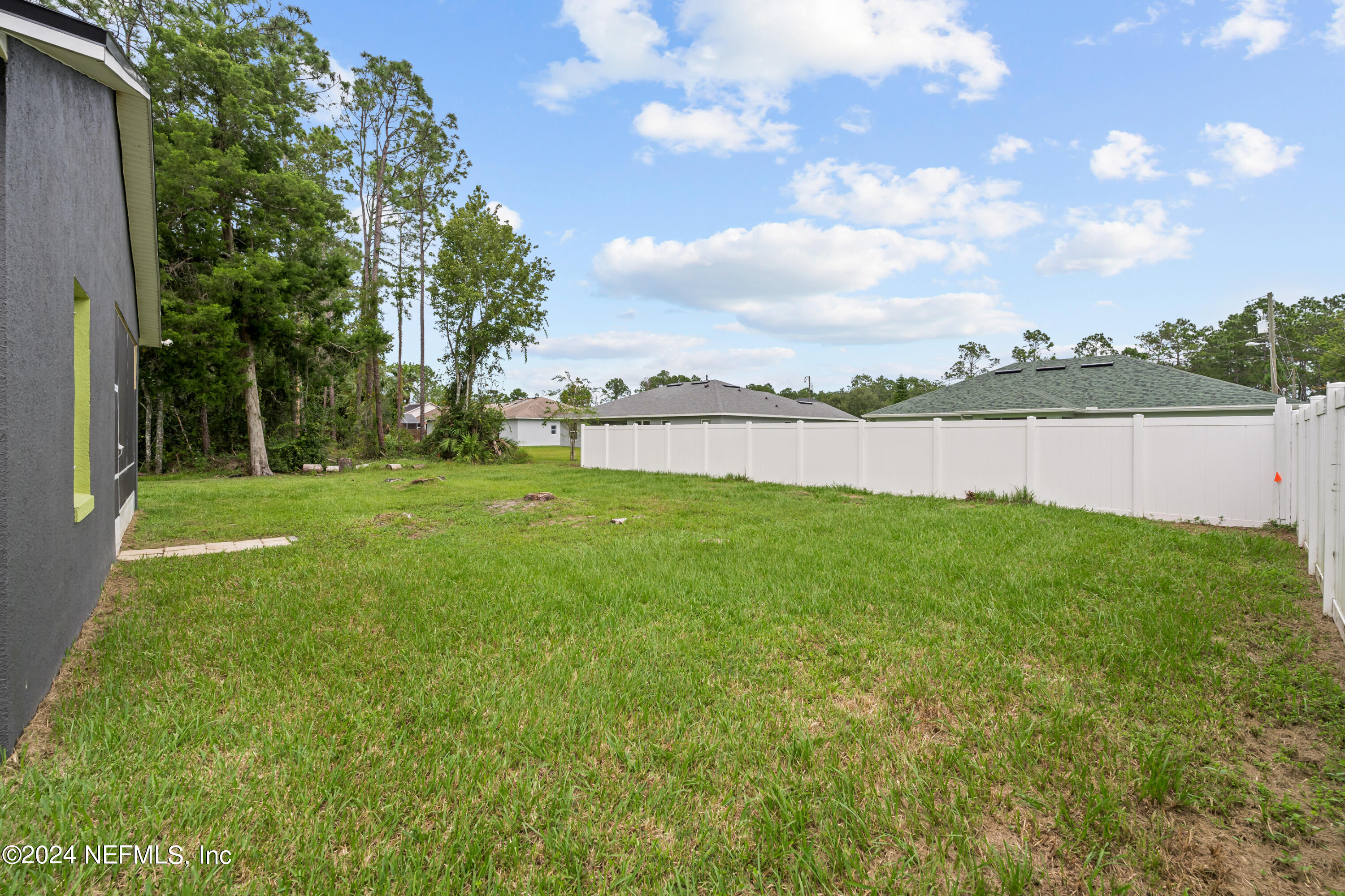 26 Zonal Geranium Trail Palm Coast, FL 32164 - Photo 32 of 35 a view of yard with swimming pool and green space