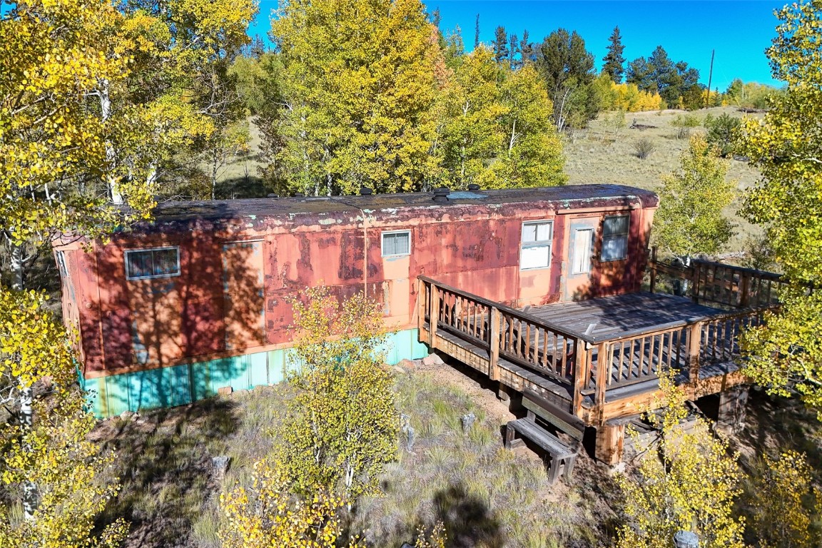 1404 Buffalo Ridge Road Como, CO 80432 - Photo 18 of 50 a view of a house with wooden fence
