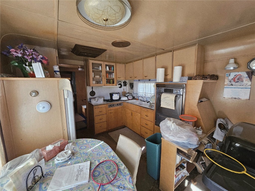 1404 Buffalo Ridge Road Como, CO 80432 - Photo 27 of 50 a room with furniture a rug and white walls
