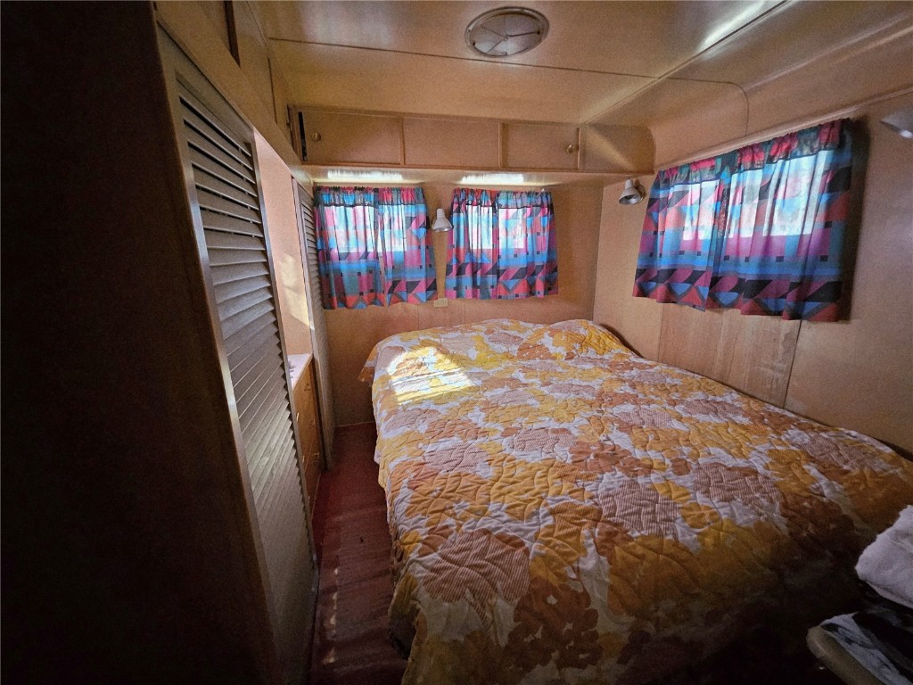 1404 Buffalo Ridge Road Como, CO 80432 - Photo 31 of 50 a bed sitting in a bedroom next to a window