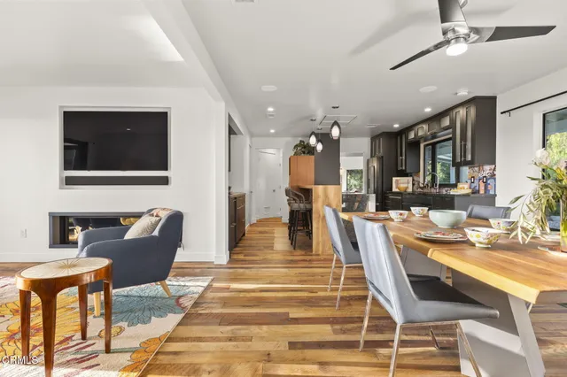 a bedroom with a bed and glass windows