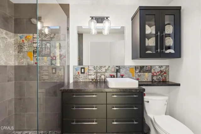 a front view of houses with yard