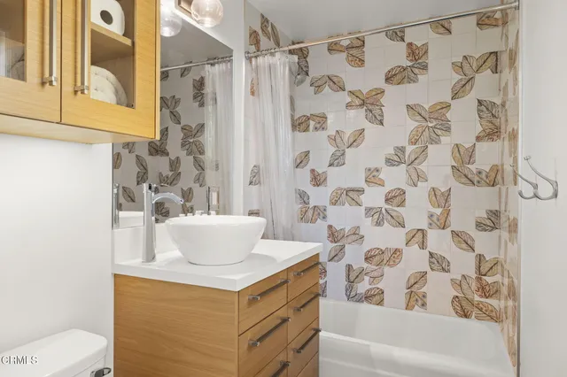 a view of a swimming pool and trees in the background