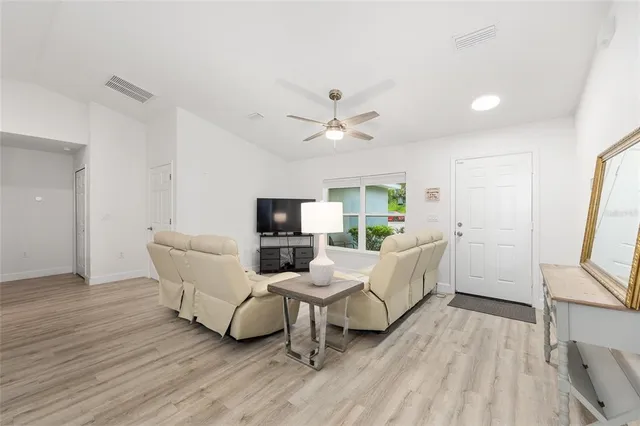 a kitchen with a sink a counter top space and appliances
