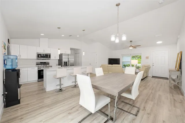 a aerial view of a house with a yard