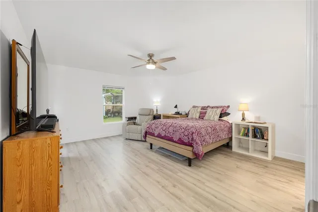 an aerial view of a house with outdoor space