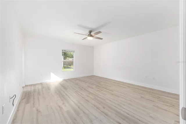 an aerial view of a house with a garden
