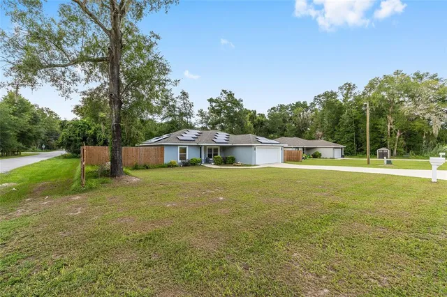 a view of a yard with a slide