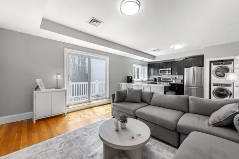 a living room with furniture and a couch
