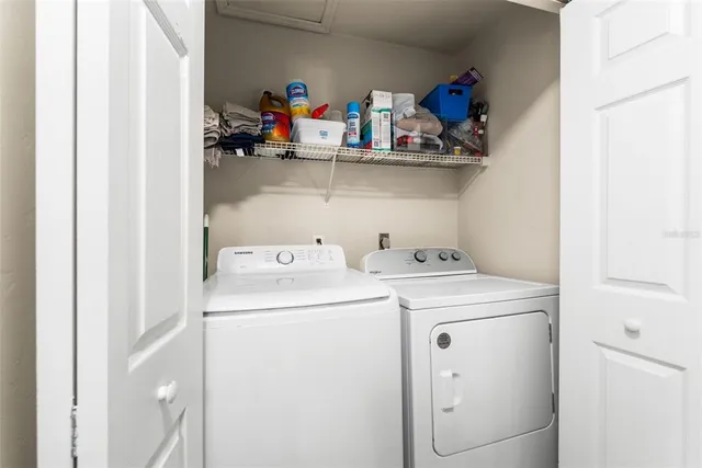 a utility room with dryer and washer