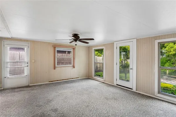 an empty room with windows