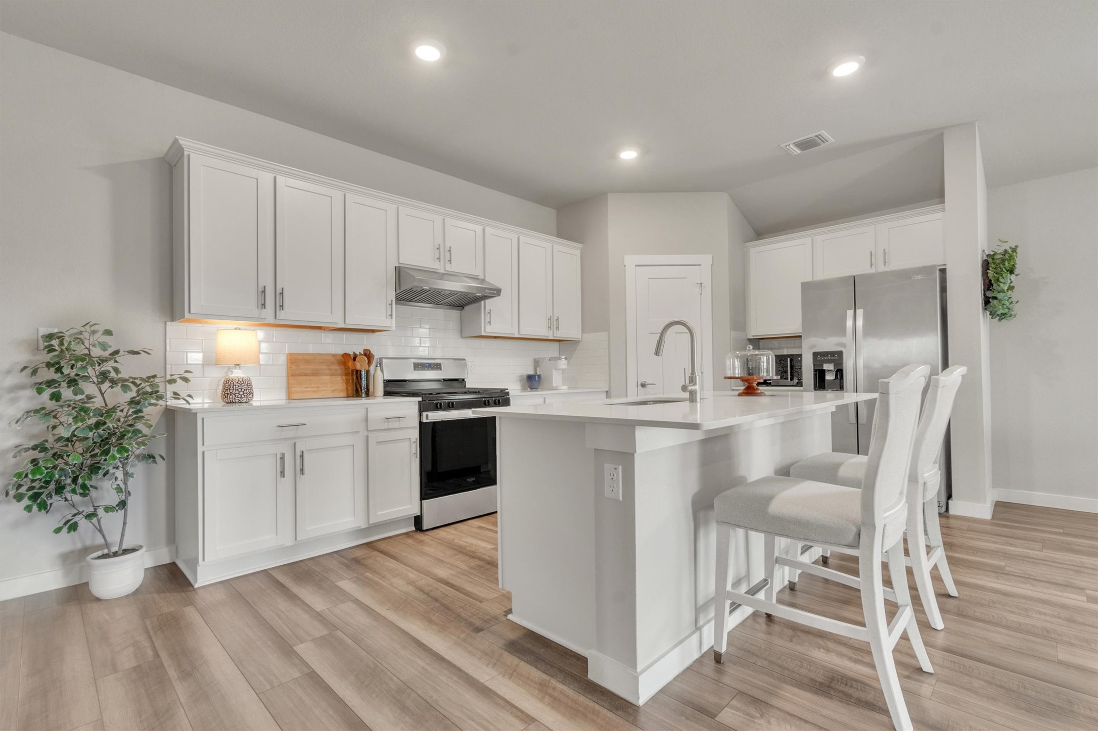 1008 Tipton Street Georgetown, TX 78633 - Photo 32 of 38 Kitchen island with space for 3 barstools