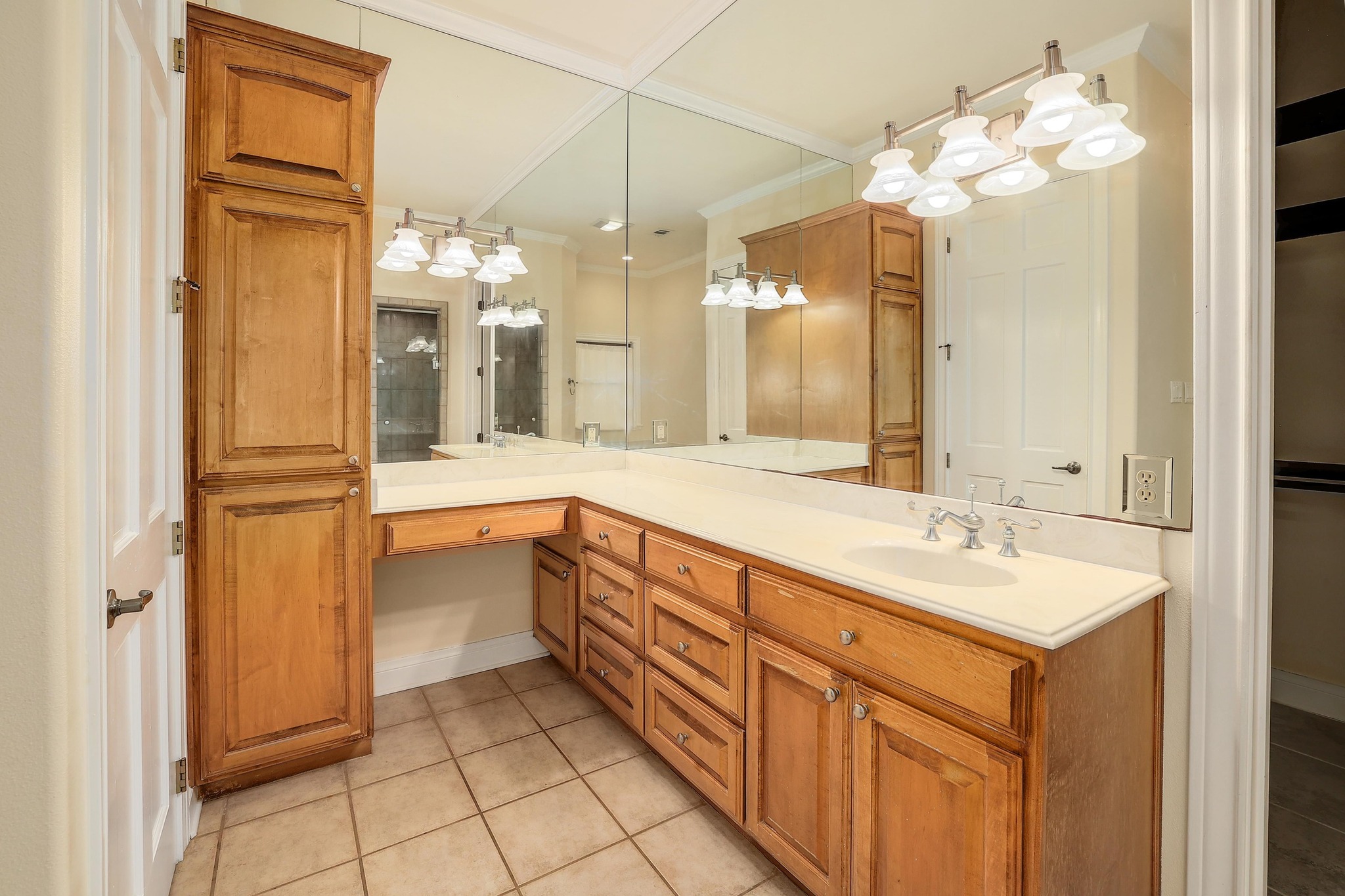 3900 Shell Road Georgetown, TX 78628 - Photo 19 of 40 Full bathroom featuring light tile patterned flooring, double vanity, and ornamental molding