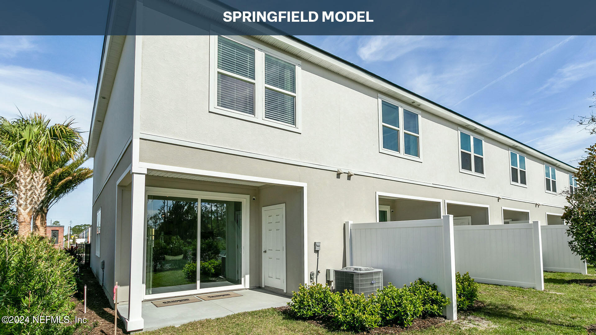 70 Montellano Road St. Augustine, FL 32084 - Photo 27 of 37 a front view of a building with a garden