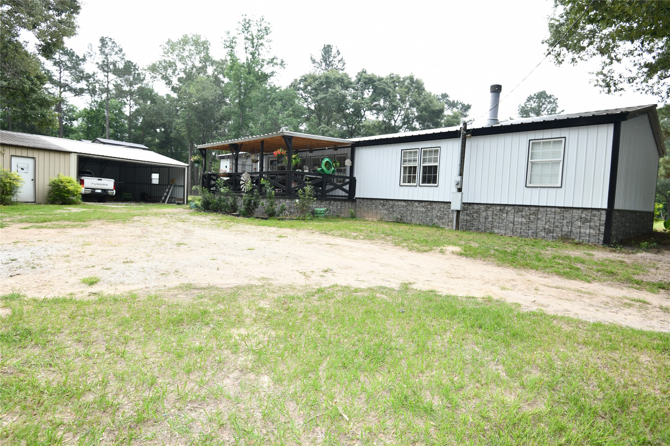 101 Pinewood Drive Shepherd, TX 77371 - Photo 26 of 37 Rear View