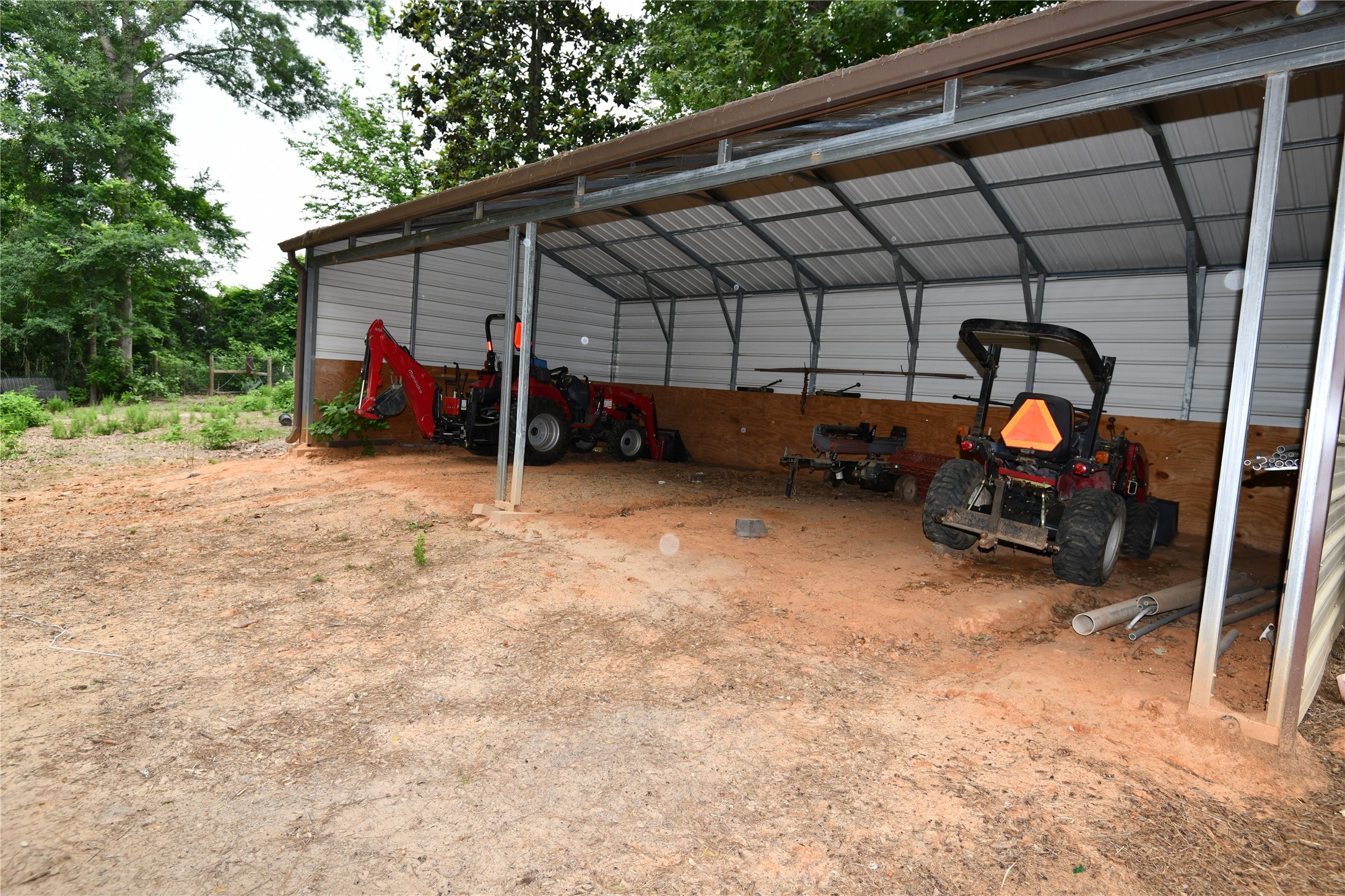 101 Pinewood Drive Shepherd, TX 77371 - Photo 35 of 37 34x18 Equipment Shed