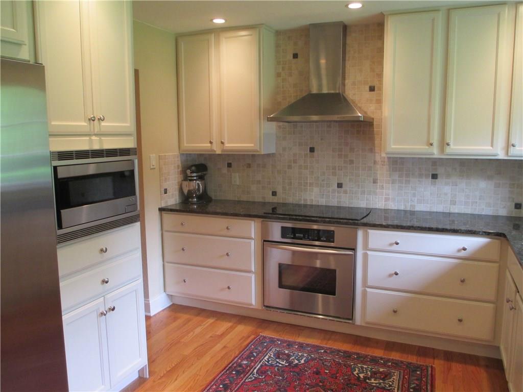 115 West Chapel Ridge Road Pittsburgh, PA 15238 - Photo 6 of 21 Immaculately Updated Kitchen with Stainless Steel Appliances