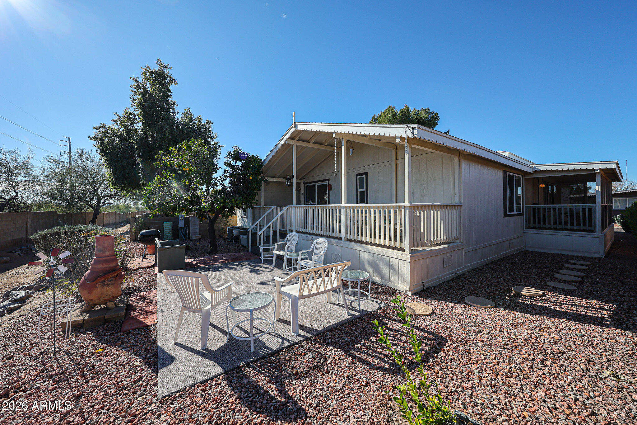 3901 East Pinnacle Peak Road, Unit 270 Phoenix, AZ 85050 - Photo 1 of 27 a front view of a house with sitting area