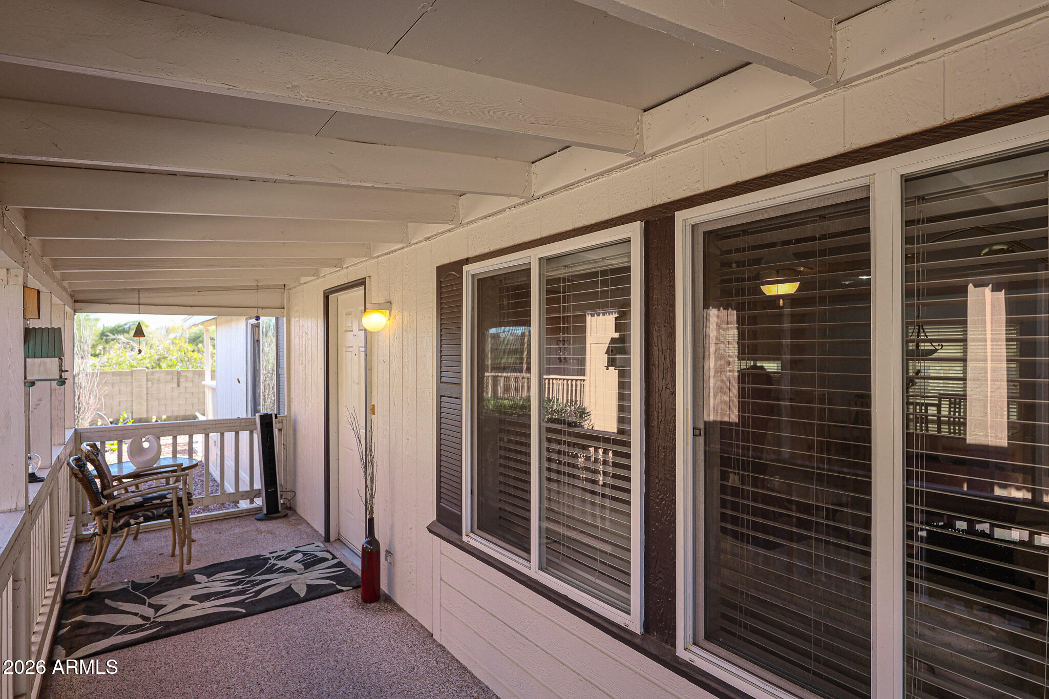 3901 East Pinnacle Peak Road, Unit 270 Phoenix, AZ 85050 - Photo 20 of 27 a view of a livingroom with outdoor space