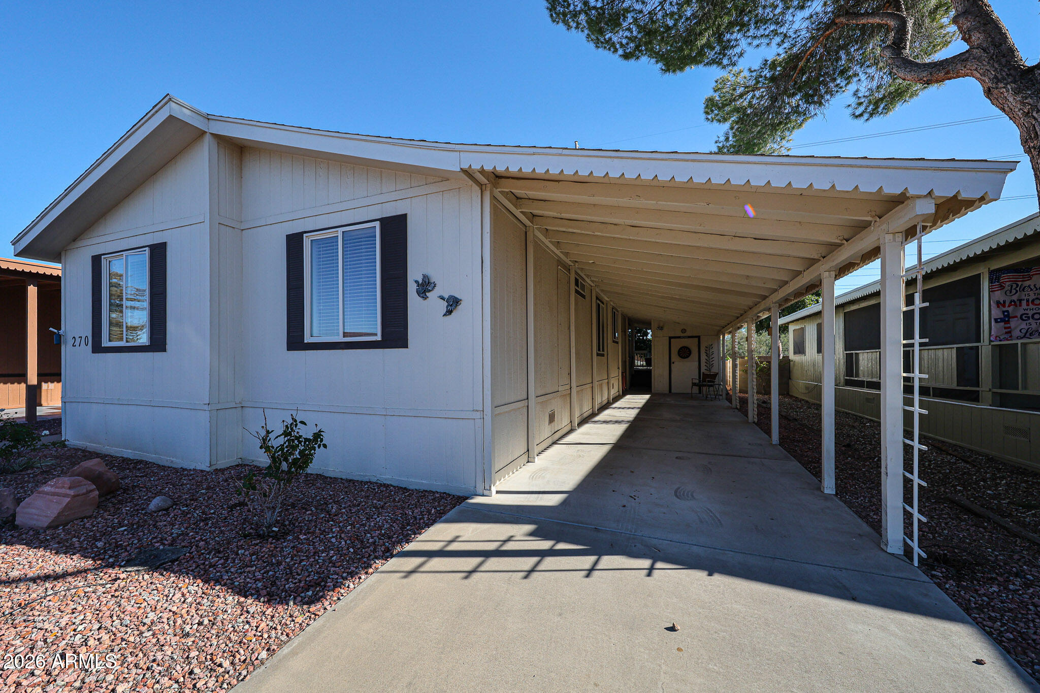 3901 East Pinnacle Peak Road, Unit 270 Phoenix, AZ 85050 - Photo 22 of 27 a view of a house with a balcony