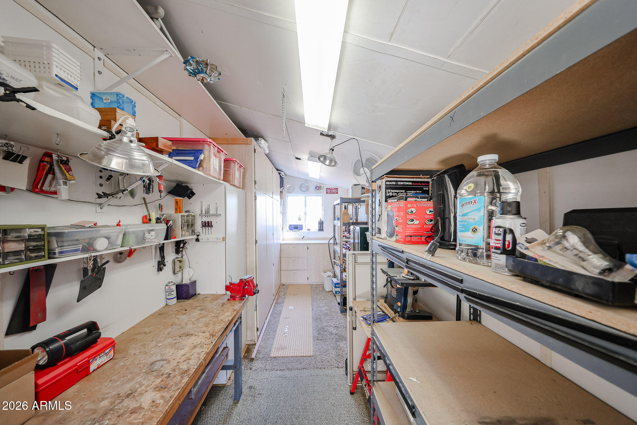 3901 East Pinnacle Peak Road, Unit 270 Phoenix, AZ 85050 - Photo 25 of 27 a storage room with cabinets