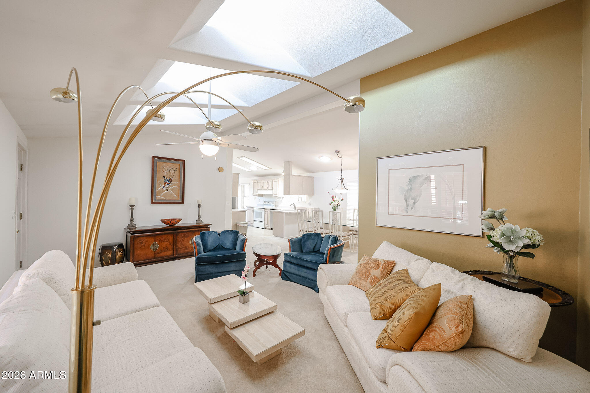 3901 East Pinnacle Peak Road, Unit 270 Phoenix, AZ 85050 - Photo 8 of 27 a living room with furniture and a large window