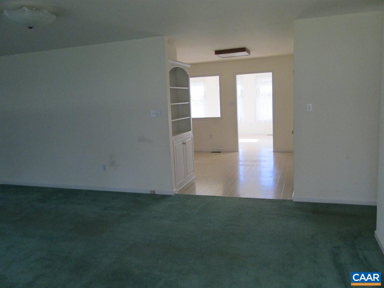 730 River Road Madison, VA 22727 - Photo 20 of 23 a view of an empty room with wooden floor and a window
