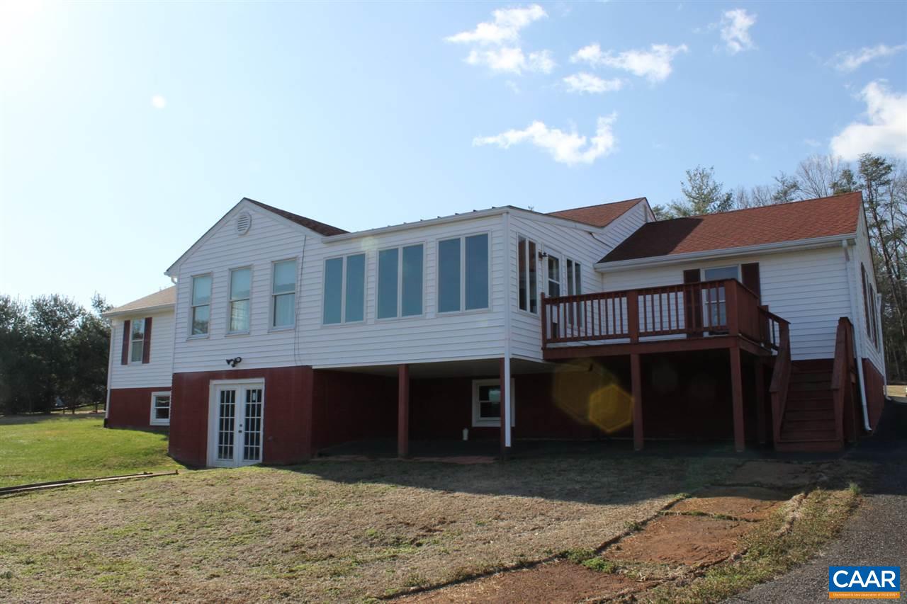 730 River Road Madison, VA 22727 - Photo 5 of 23 a front view of a house with a yard