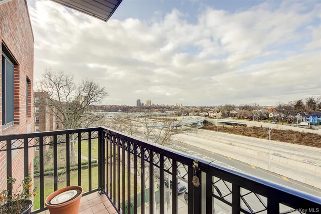 a view of a balcony with city view