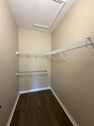 a view of an empty walk in closet