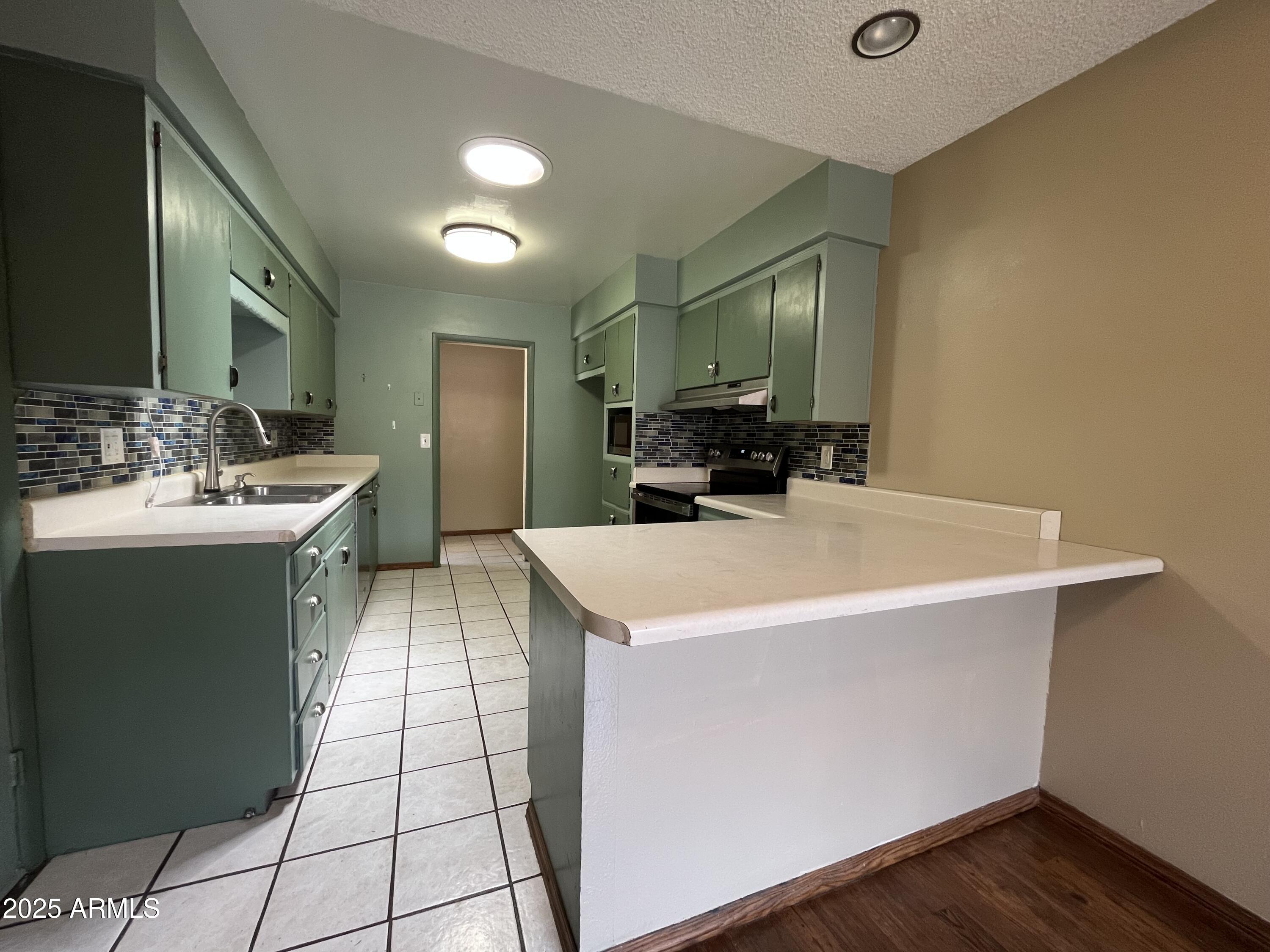 1707 North Fort Valley Road Flagstaff, AZ 86001 - Photo 2 of 14 a view of a kitchen from the kitchen