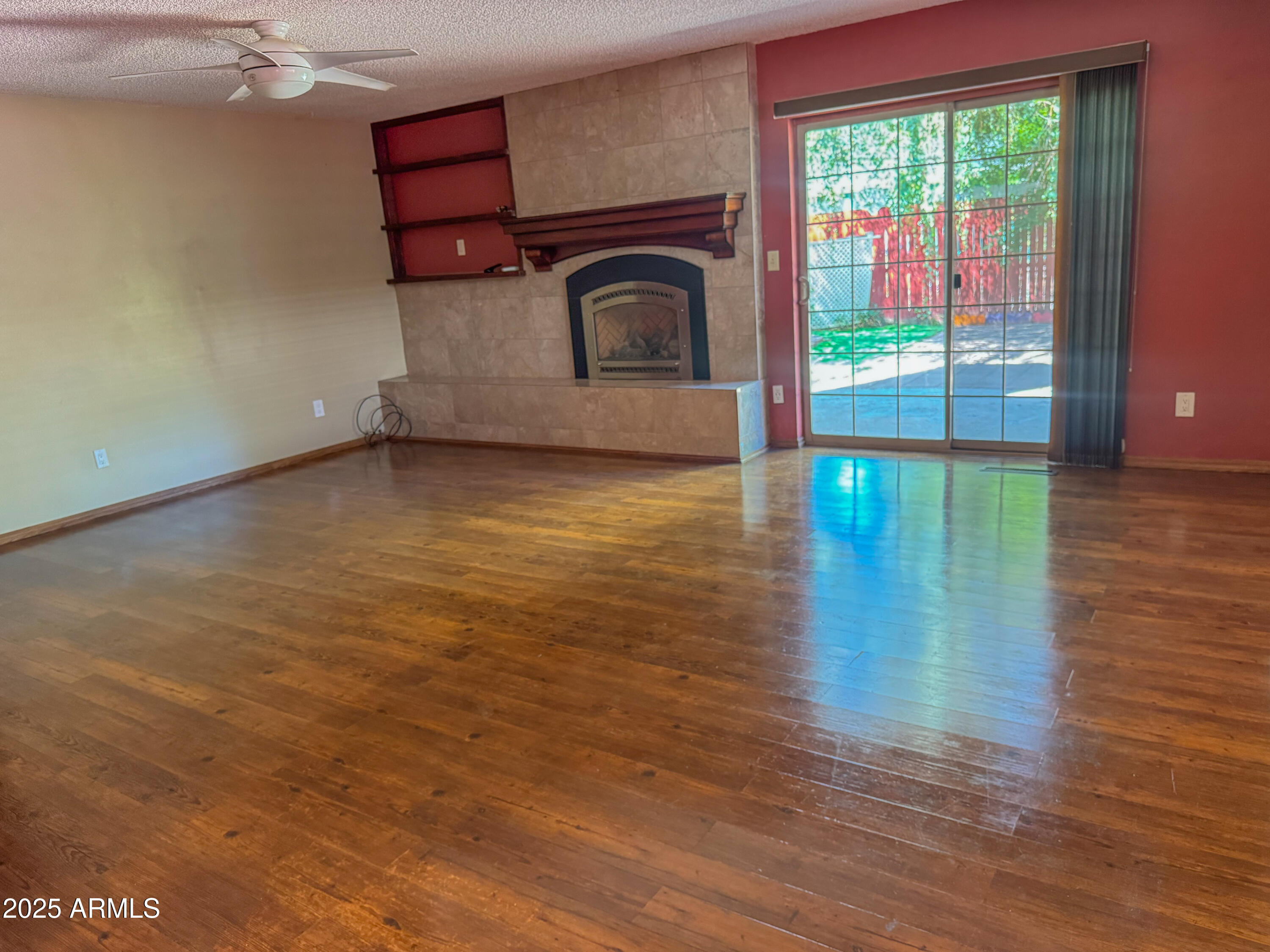 1707 North Fort Valley Road Flagstaff, AZ 86001 - Photo 3 of 14 a view of empty room with wooden floor and fan