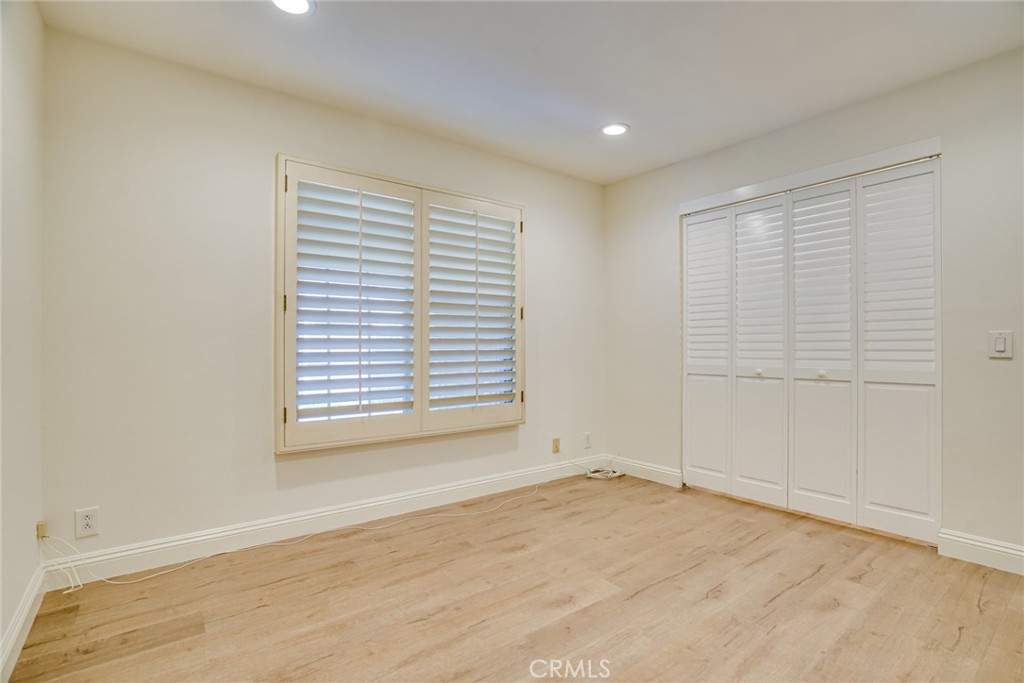 49 East Yale Loop, Unit 26 Irvine, CA 92604 - Photo 22 of 63 a view of an empty room with a window