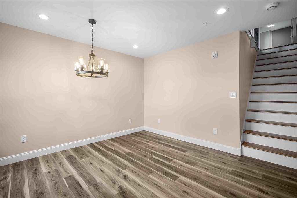 4 Sabrina Way, Unit F Feeding Hills, MA 01030 - Photo 10 of 34 a view of empty room with wooden floor